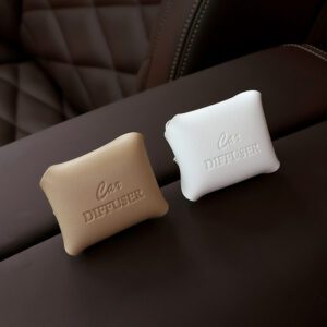 Leather car air freshener clipped to car air vent outlet