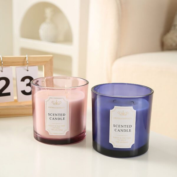 3 wick scented candles in pink, white, black jars