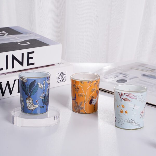 Three Patterned Scented Candles in Home Setting