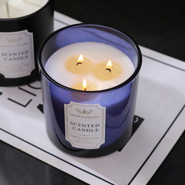 aromatherapy candles with three wicks burning evenly