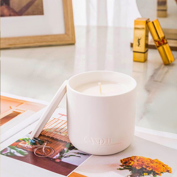 hand-poured aromatherapy candle in ceramic container