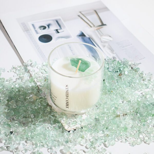 top view of scented candles with crystals inside wax