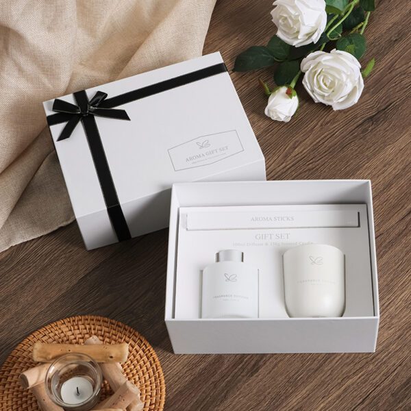 White Aroma Gift Set with diffuser and candle displayed on white gift box with ribbon