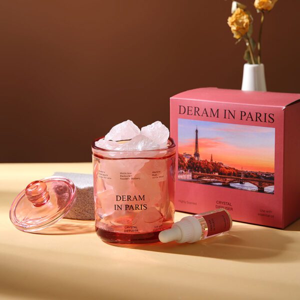 Pink glass aroma stone jar labeled “Deram in Paris” with box