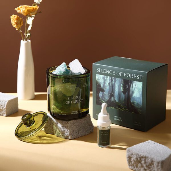 Forest themed crystal diffuser set in green glass jar
