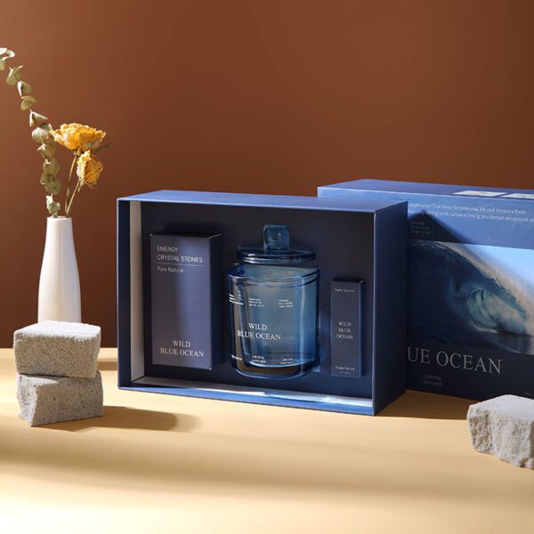 Blue crystal diffuser gift box open to display glass jar and accessories