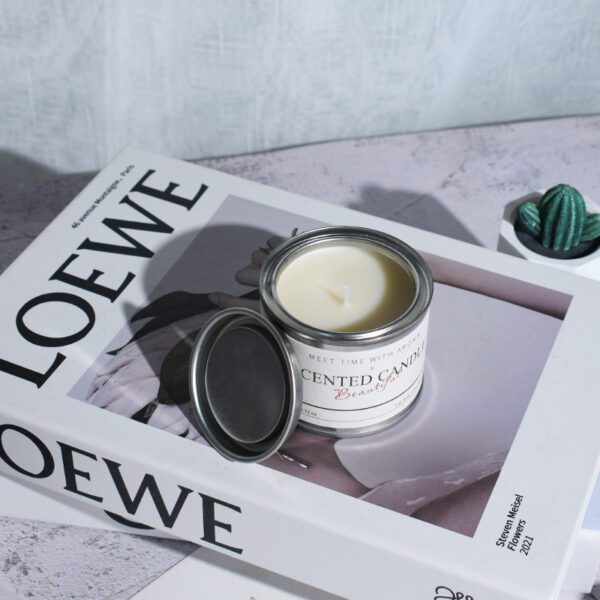 open travel tin candle showing white soy wax and cotton wick