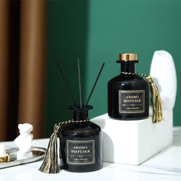 Elegant black glass diffuser styled in a modern home setting