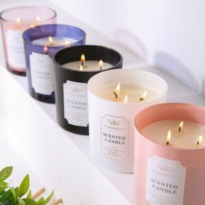 multi wick candles in colored glass jars