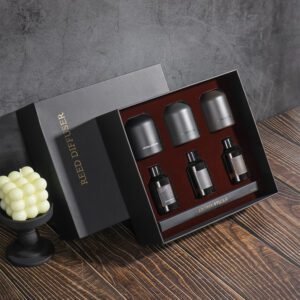 reed diffuser gift set with three bottles and fragrance oils in black box