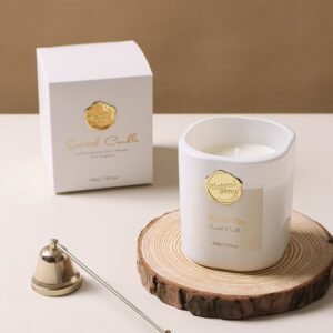 Aromatherapy candle with fragrance in glass jar on table