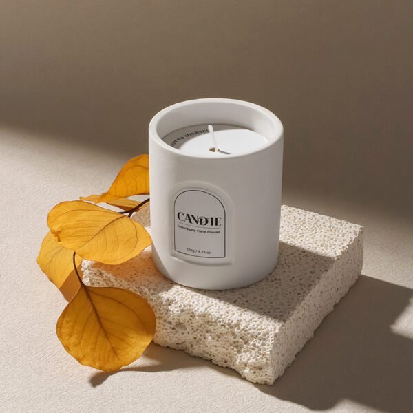 lifestyle shot: Oud & Bergamot ceramic candle on marble tray
