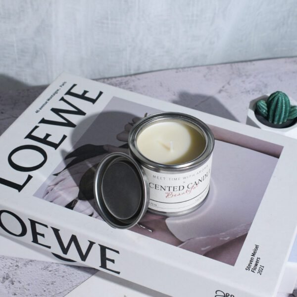 open travel tin candle showing white soy wax and cotton wick