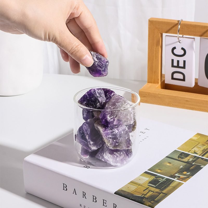 Crystal stone diffuser with natural quartz and essential oil on tray